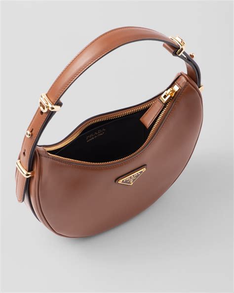 prada handtasche cognac|The Small and Mighty Prada Arqué Bag .